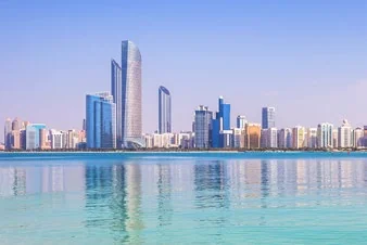 Abu Dhabi skyline and Gulf waters